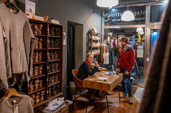 Two people are standing in a store.